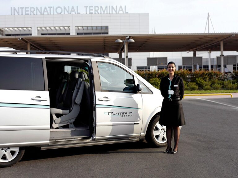 Business woman in a shuttle with the door open